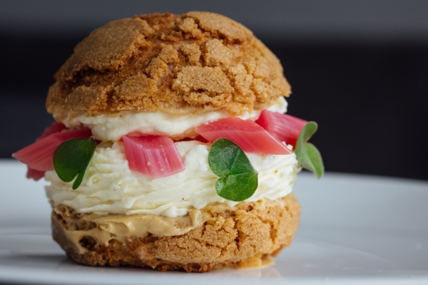 Rhubarb and custard choux bun from the new lunch menu at Twr y Felin Hotel Image Owen Howells Photography